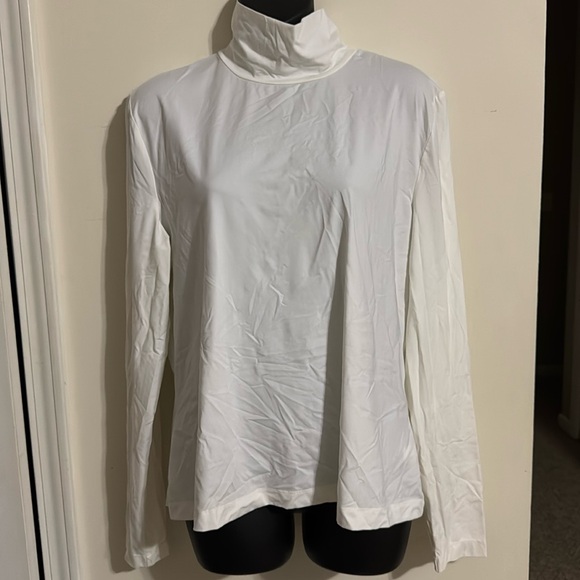 St. John Tops - ST. JOHN CAVIAR turtleneck size XL 
color off-white nylon and spandex